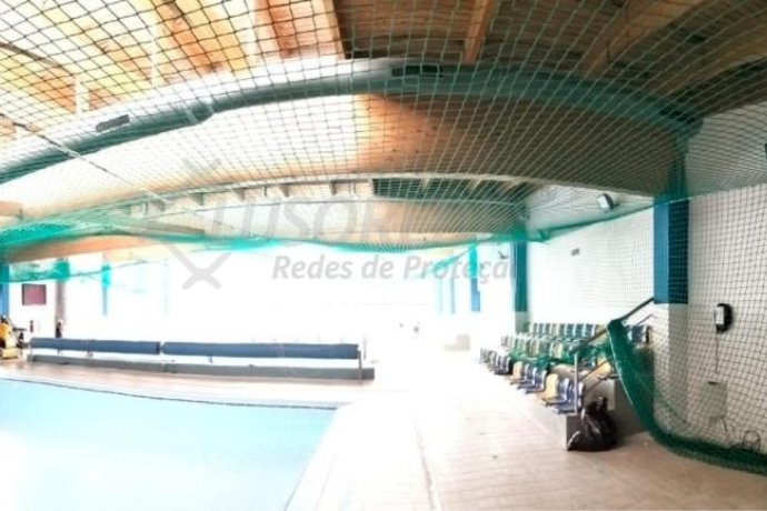 Sistema S - Rede de segurança horizontal certificada EN 1263, ideal para zonas amplas e trabalhos internos.