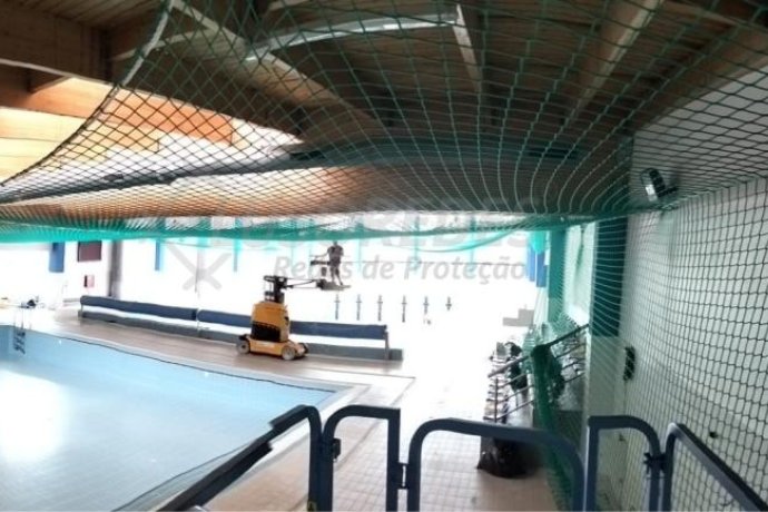 Sistema S - Rede de segurança horizontal certificada EN 1263, ideal para zonas amplas e trabalhos internos.